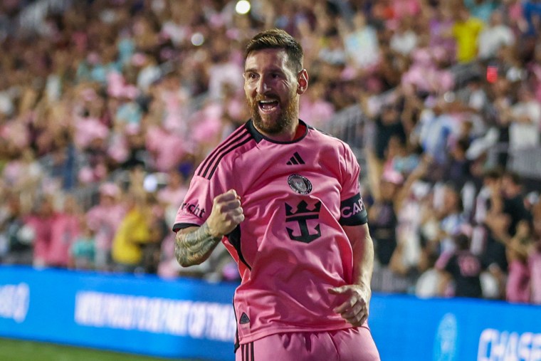 Lionel Messi celebrates after scoring