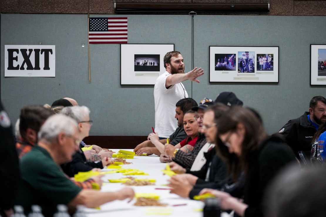 Volunteers tally votes on a new contract offer from <a href=